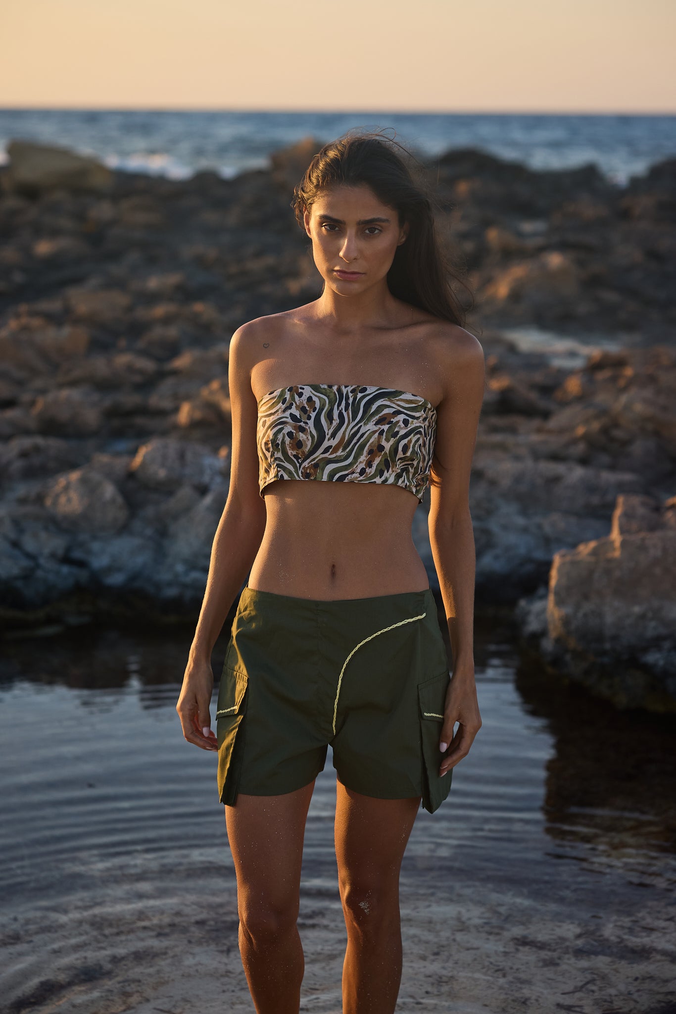 Olive cargo shorts, front view