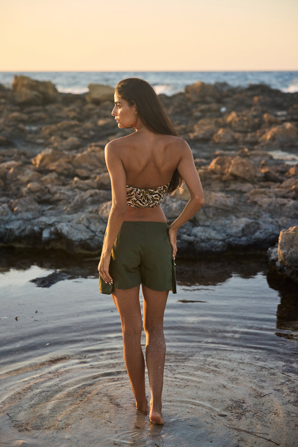 olive cargo shorts, back view